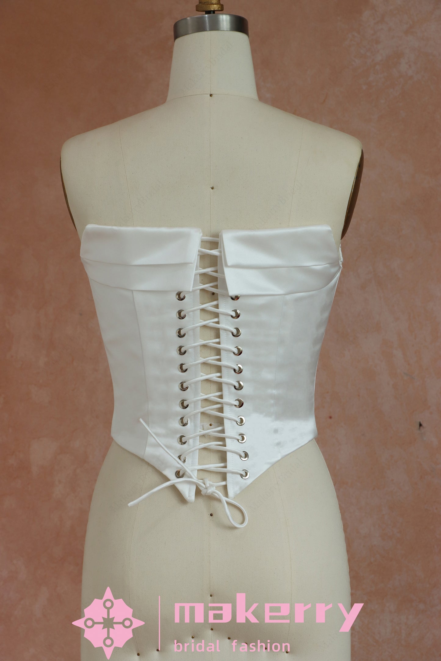 Mini Bridal Dress With A Structured Corset Bodice And Pleated Skirt