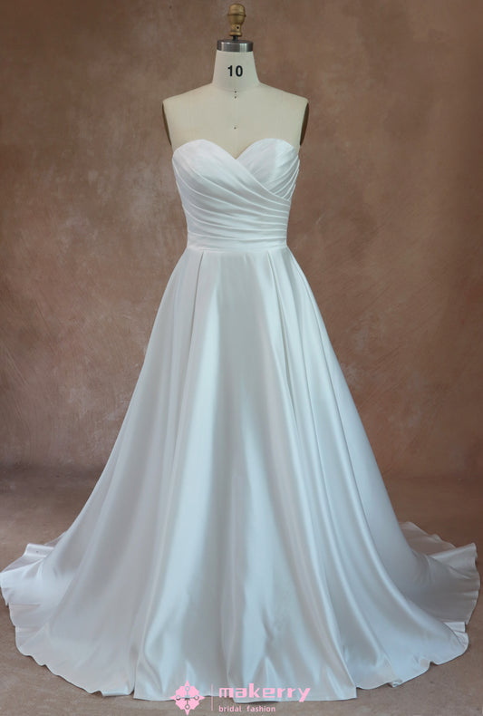 Satin ballgown wedding dress with strapless neckline