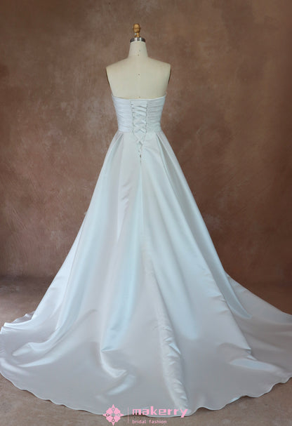 Satin ballgown wedding dress with strapless neckline