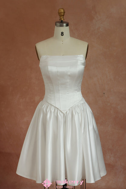 Mini Bridal Dress With A Structured Corset Bodice And Pleated Skirt