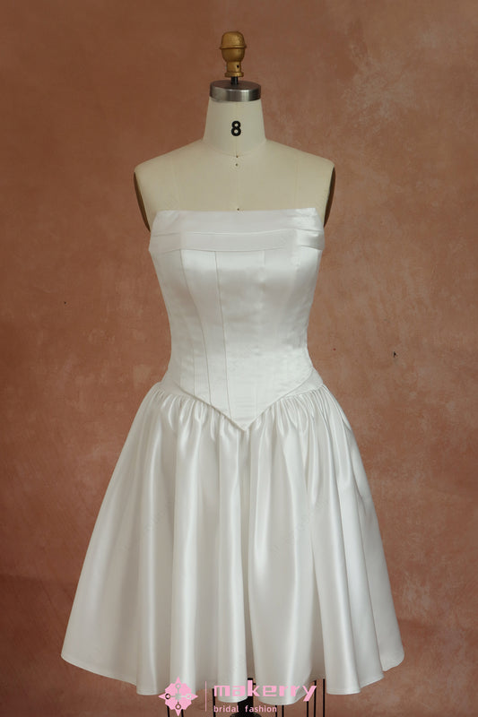 Mini Bridal Dress With A Structured Corset Bodice And Pleated Skirt
