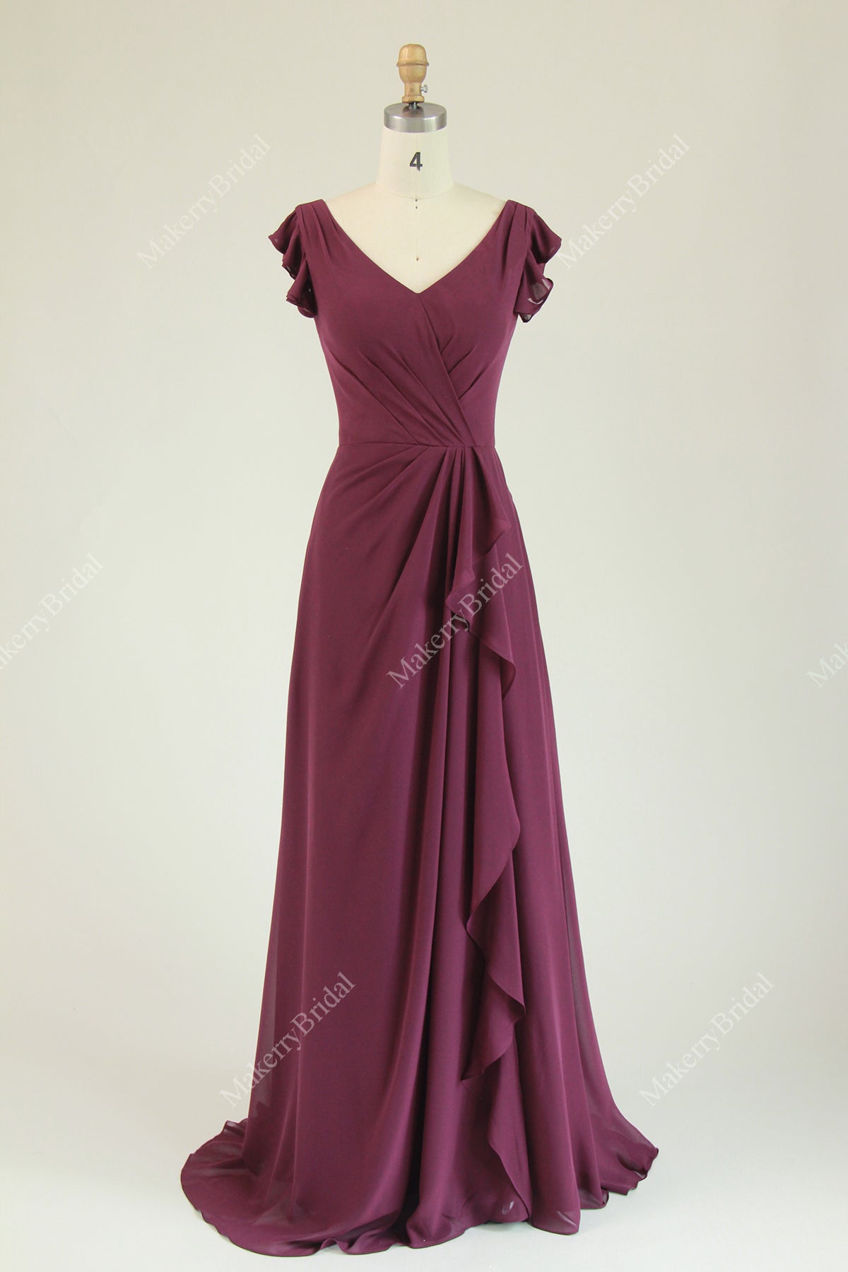 Chiffon Bridesmaid Dress Featuring Ruffled Cap Sleeves And Cascading Ruffle Detail