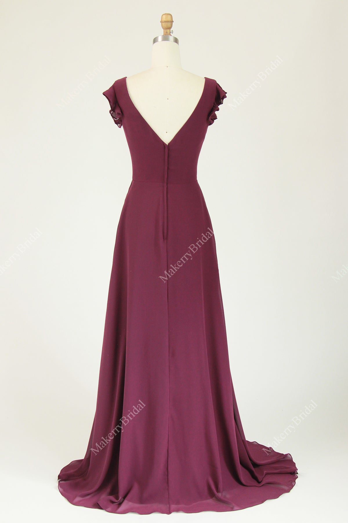 Chiffon Bridesmaid Dress Featuring Ruffled Cap Sleeves And Cascading Ruffle Detail