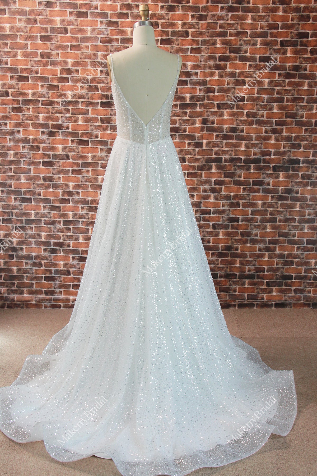 Beaded Tulle A-line wedding dress with a plunging V-back