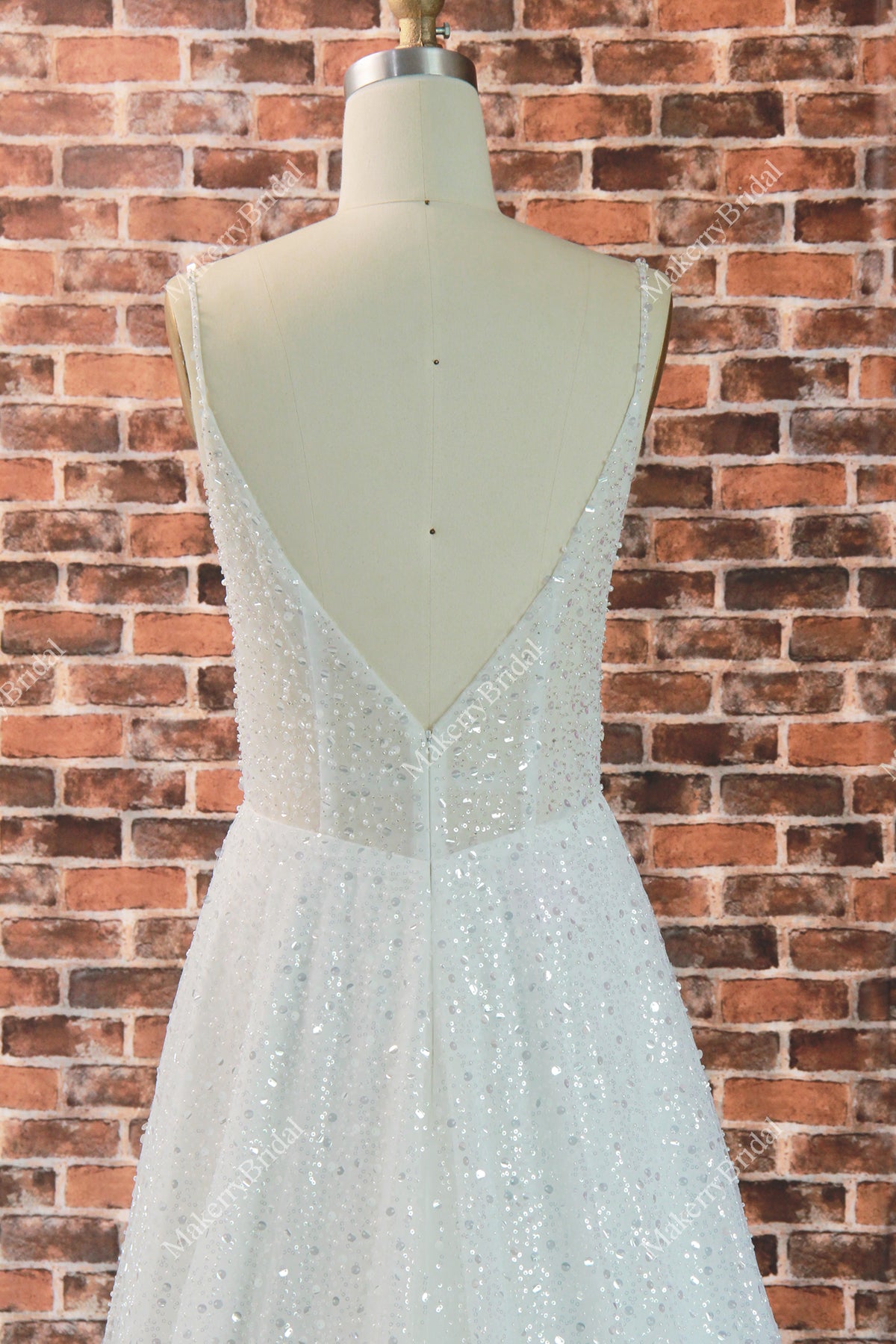 Beaded Tulle A-line wedding dress with a plunging V-back