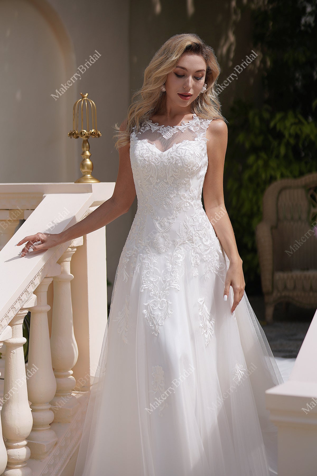 The Soft Tulle A Line Wedding Dress Has An Illusion Neckline And Sheer Back