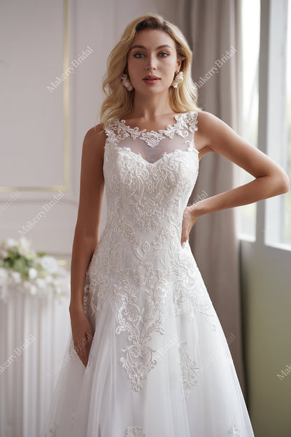 The Soft Tulle A-Line Wedding Dress Has An Illusion Neckline And Sheer Back