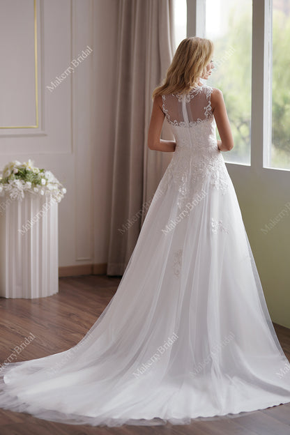 The Soft Tulle A-Line Wedding Dress Has An Illusion Neckline And Sheer Back