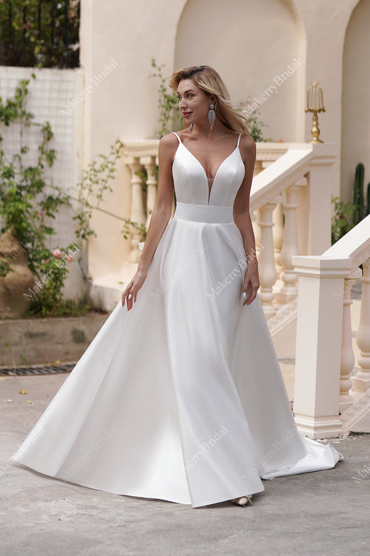 A Satin Timeless Ball Gown With Pockets