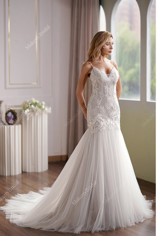 Curve-hugging beaded lace mermaid wedding gown with breathtaking illusion back