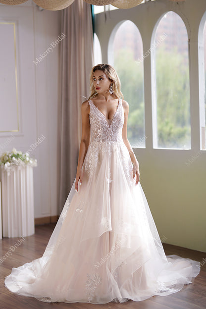 This Ball Gown Has A Sleeveless Bodice And A V-Neck Neckline