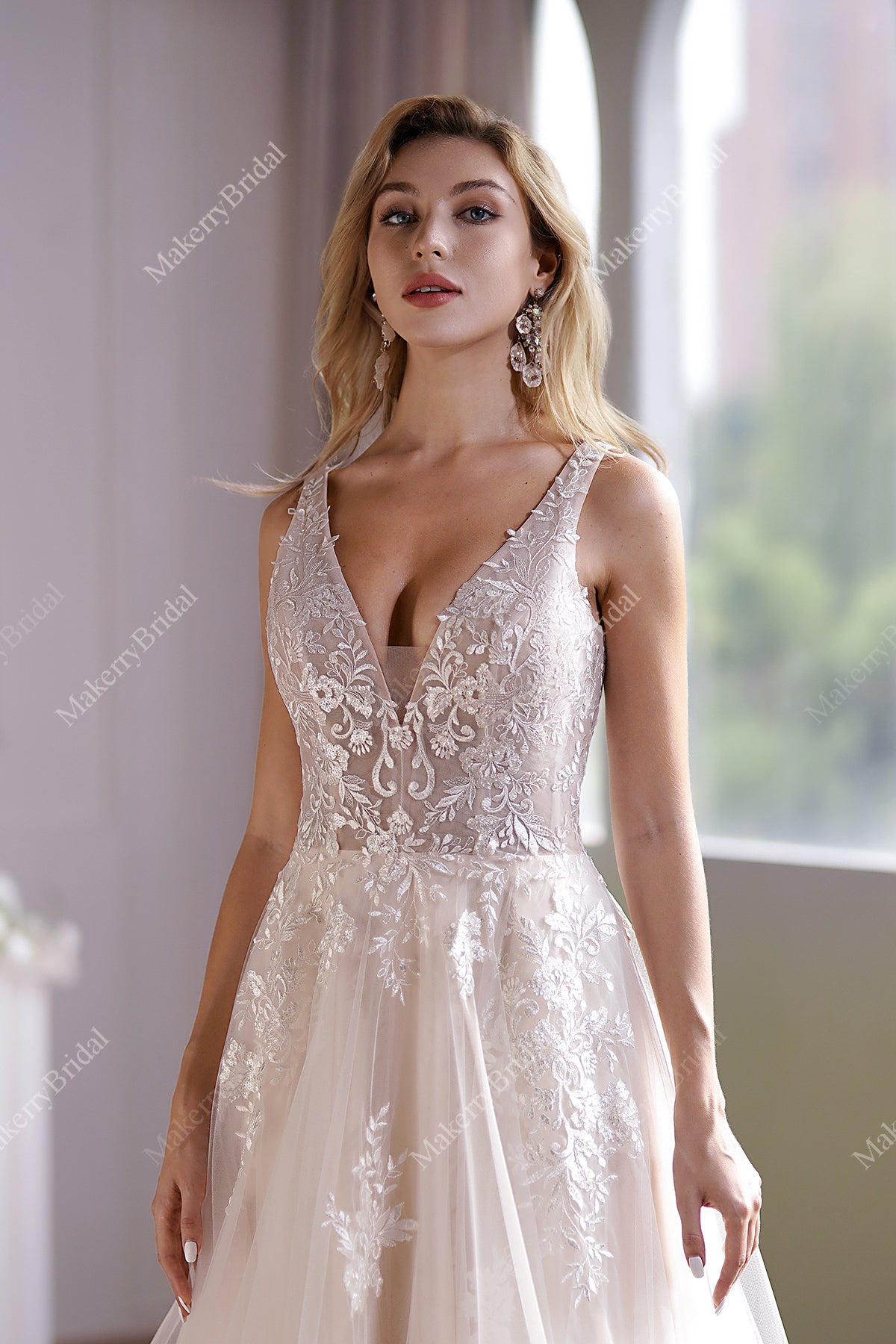 This Ball Gown Has A Sleeveless Bodice And A V-Neck Neckline