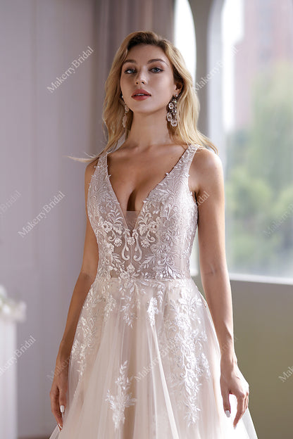 This Ball Gown Has A Sleeveless Bodice And A V-Neck Neckline