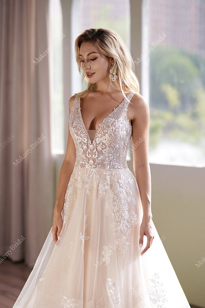 This Ball Gown Has A Sleeveless Bodice And A V-Neck Neckline