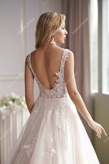 This Ball Gown Has A Sleeveless Bodice And A V-Neck Neckline