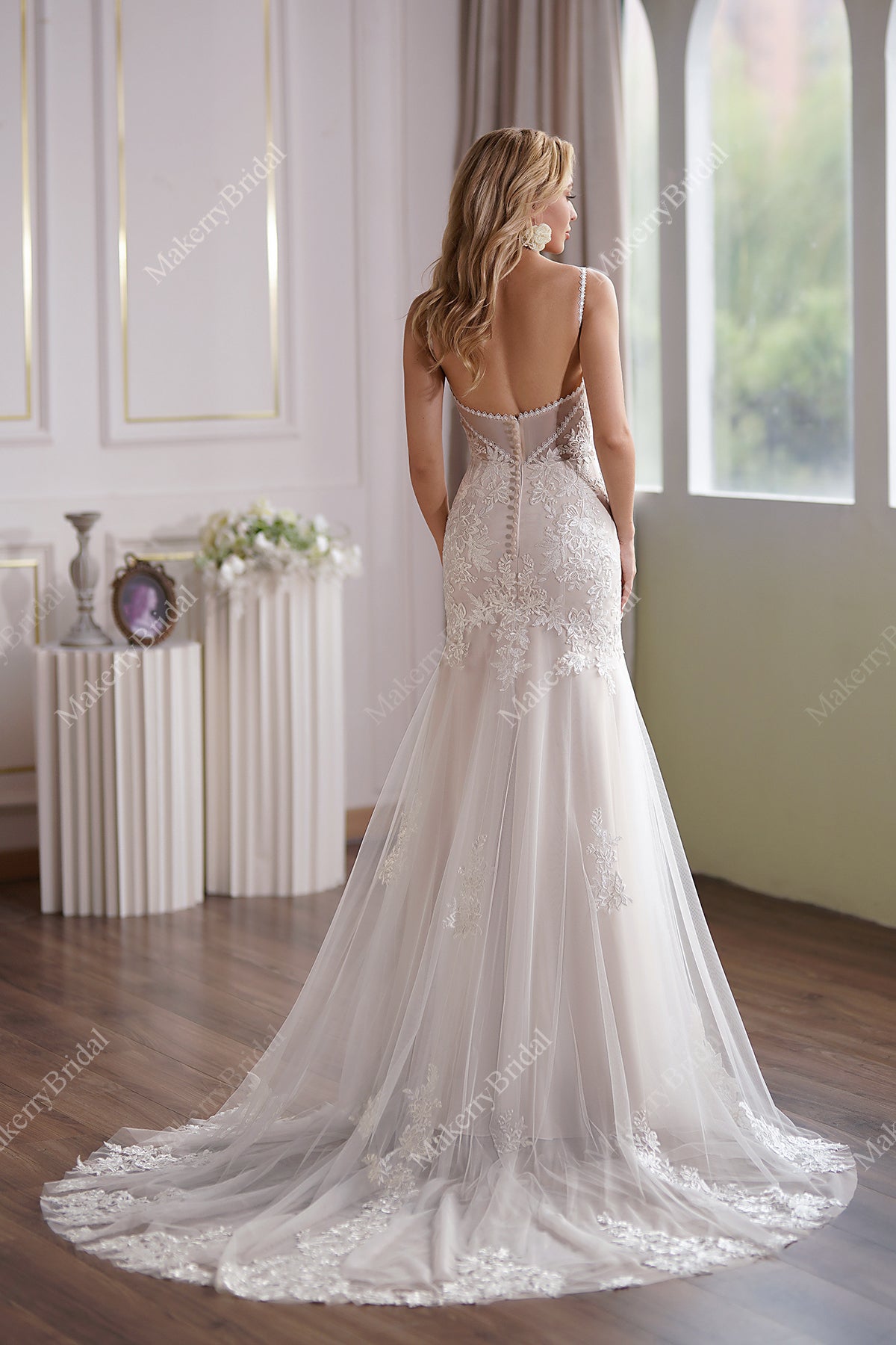 This Tulle Mermaid Bridal Gown Has A Subtle Scoop Neckline And A Sheer Back