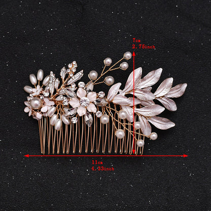 Gold hair comb with flower and leaves