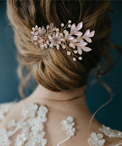 Gold hair comb with flower and leaves