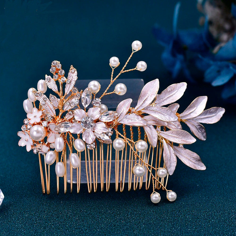 Gold hair comb with flower and leaves