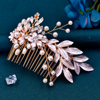 Gold hair comb with flower and leaves