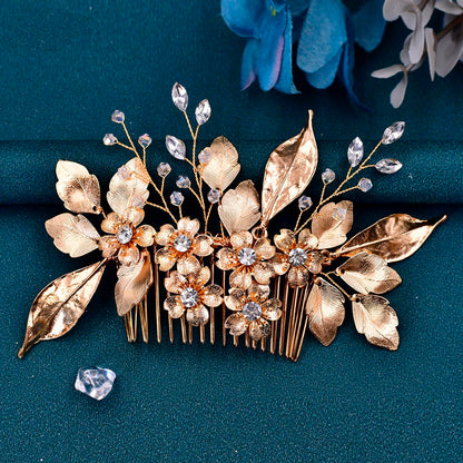 Ornate gold flower leaf bridal comb