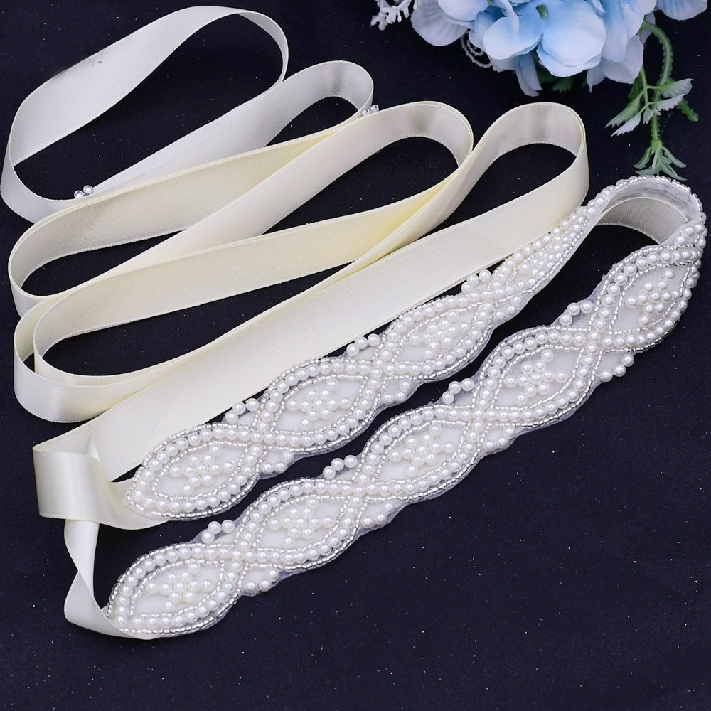 Beaded pearls wedding belt on the wedding dress